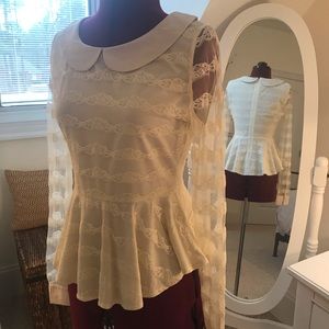Fit-and-flare cream top